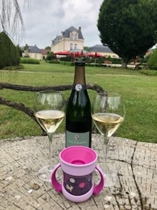 The grounds of a luxury chateau are an excellent spot to drink champagne