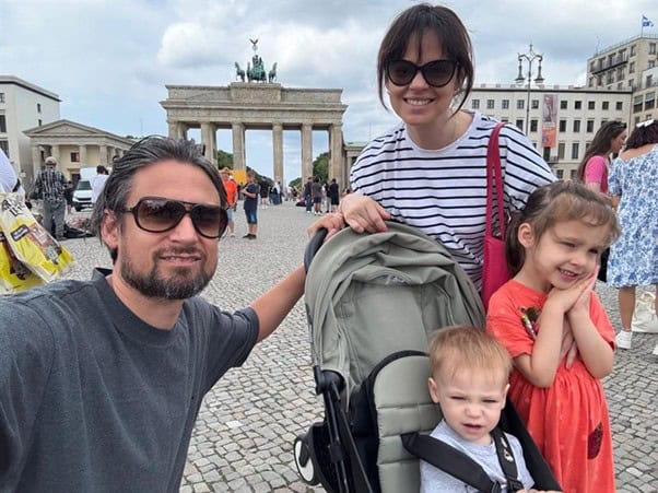 Family visiting Brandenburg Gate, Germany