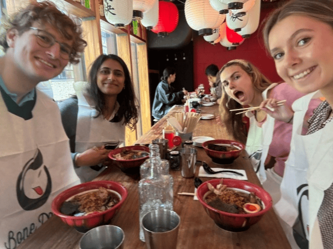 Placement students scoring lunch for their spreadsheet